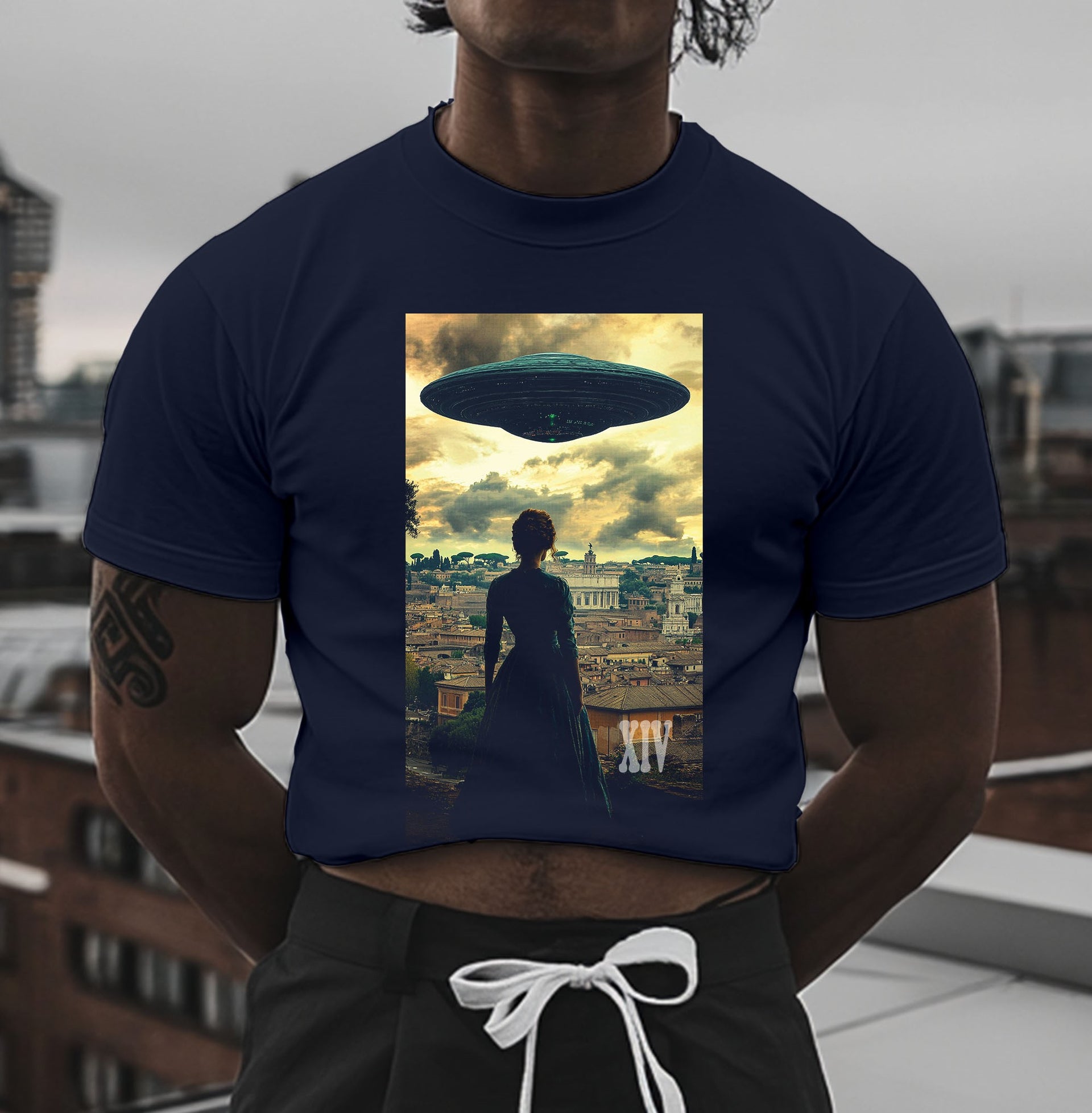 Woman Staring at UFO Over Rome – Carbon XIV Tee