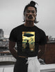 Woman Staring at UFO Over Rome – Carbon XIV Tee